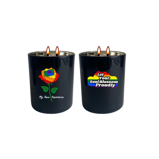 Hand-poured My Rose Experience candles with a label featuring a vibrant Let Your Soul Blossom Proudly rainbow cloud and a rainbow rose, representing our commitment to inclusivity and acceptance for the LGBTQ+ community